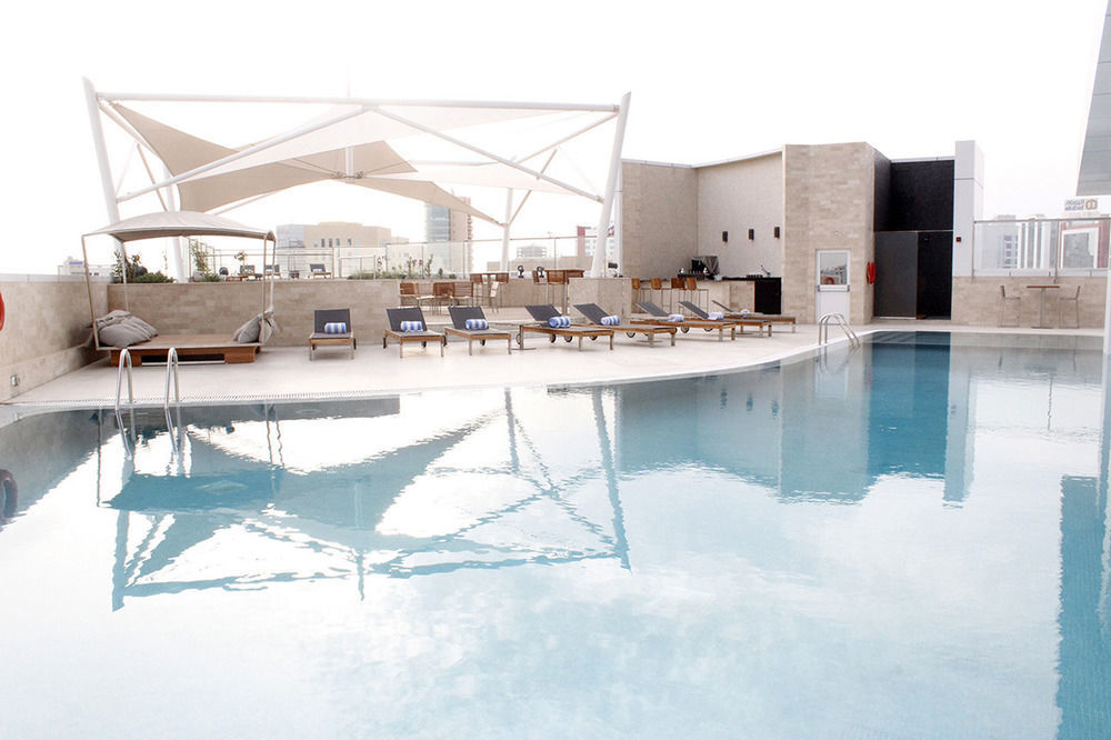 Ramee Grand Hotel And Spa Al Manamah Esterno foto The pool at the hotel